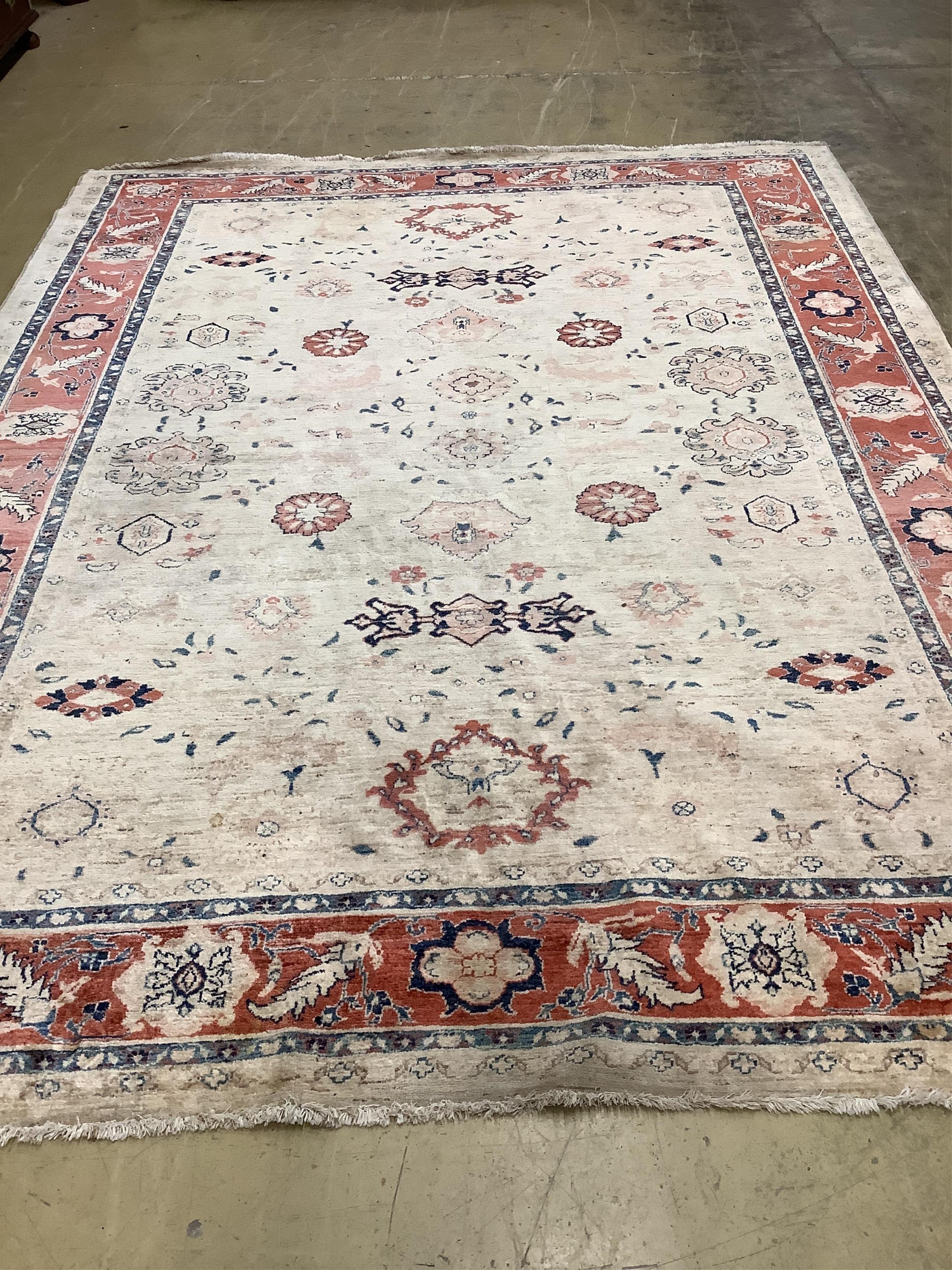 A Zeigler style ivory ground carpet 360cm x 273cm. Condition - good.